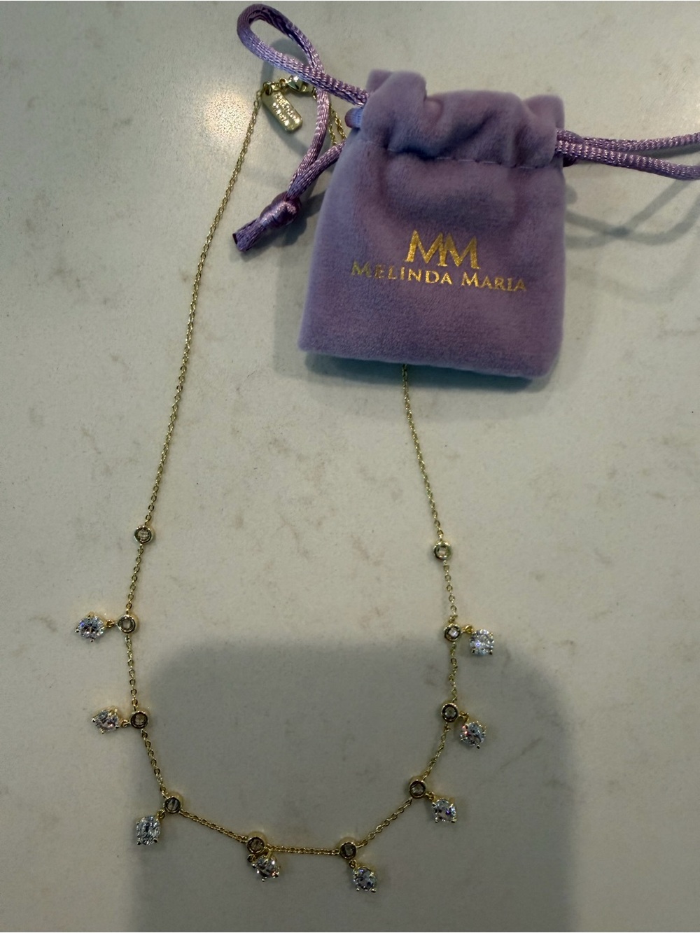 Melinda Maria Gold Necklace with Clear Crystal Drops - Purple Pouch